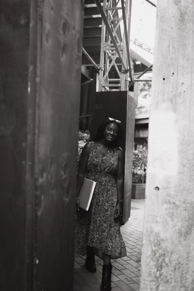 Black and white portrait of Tosin Bamidele.
